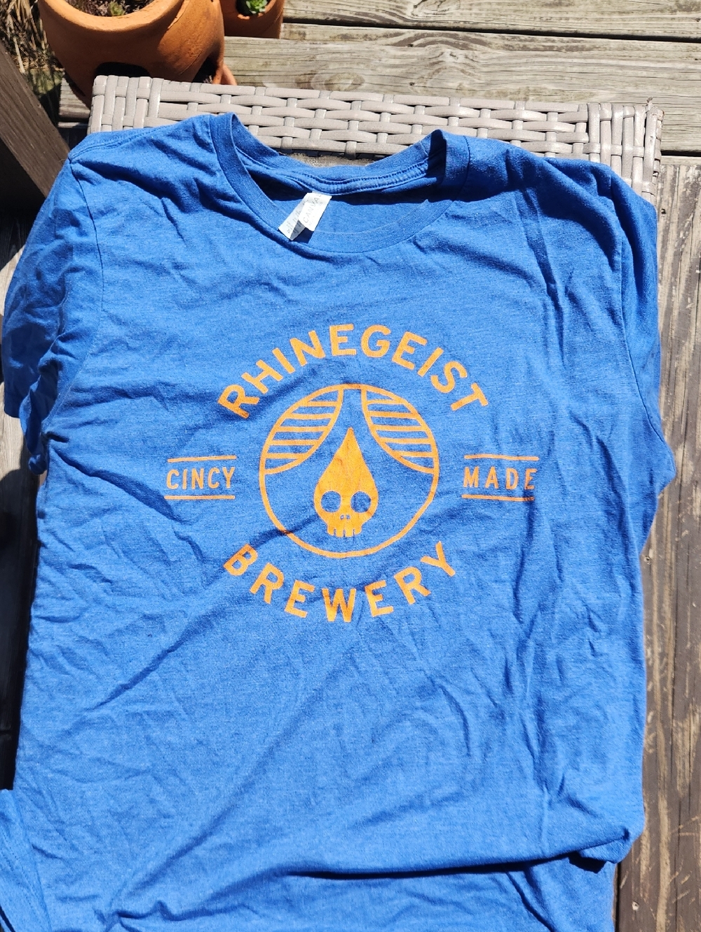 Bella Canvas Blue Tee with Orange Graphic